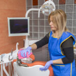 Woman cleaning dentist office